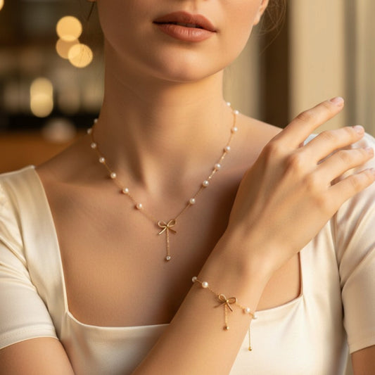 Parure Nœud Ruban & Perles – Collier & Bracelet Acier Inoxydable Doré
