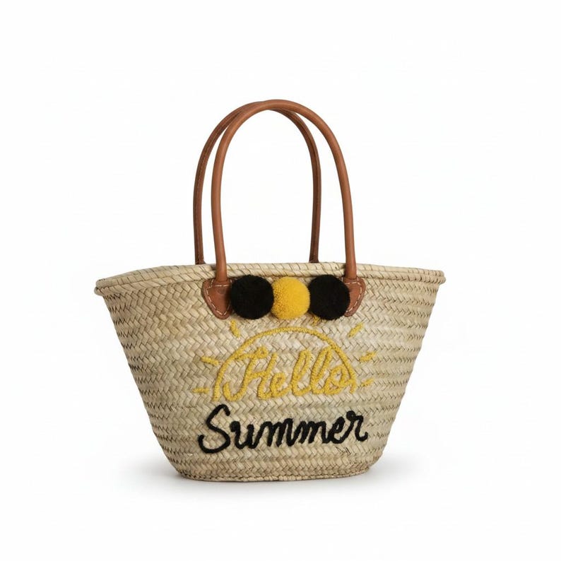 Sac de plage en paille Hello Summer avec pompons noirs et jaunes